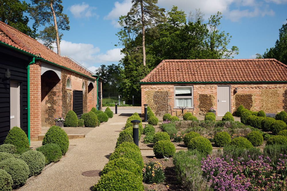 Path and buildings in the Congham Hall gardens